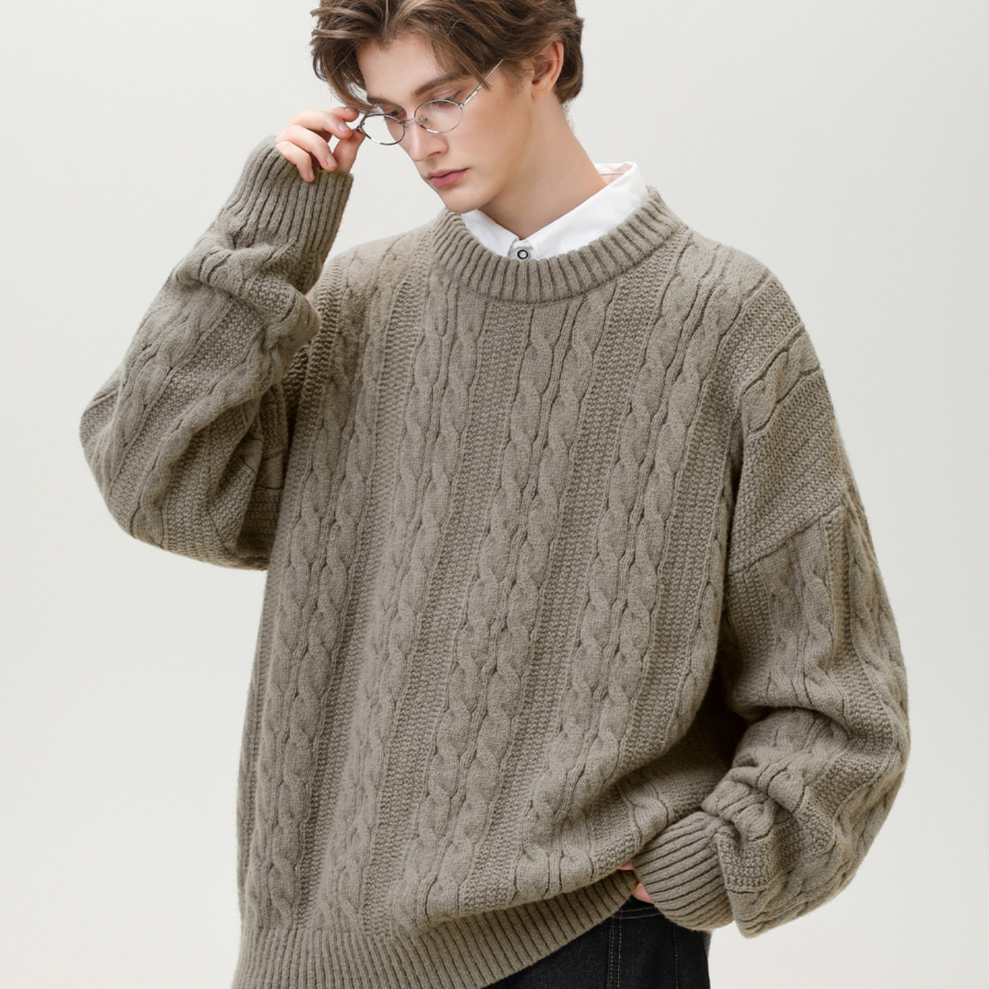 Pull homme col rond en maille torsadée
